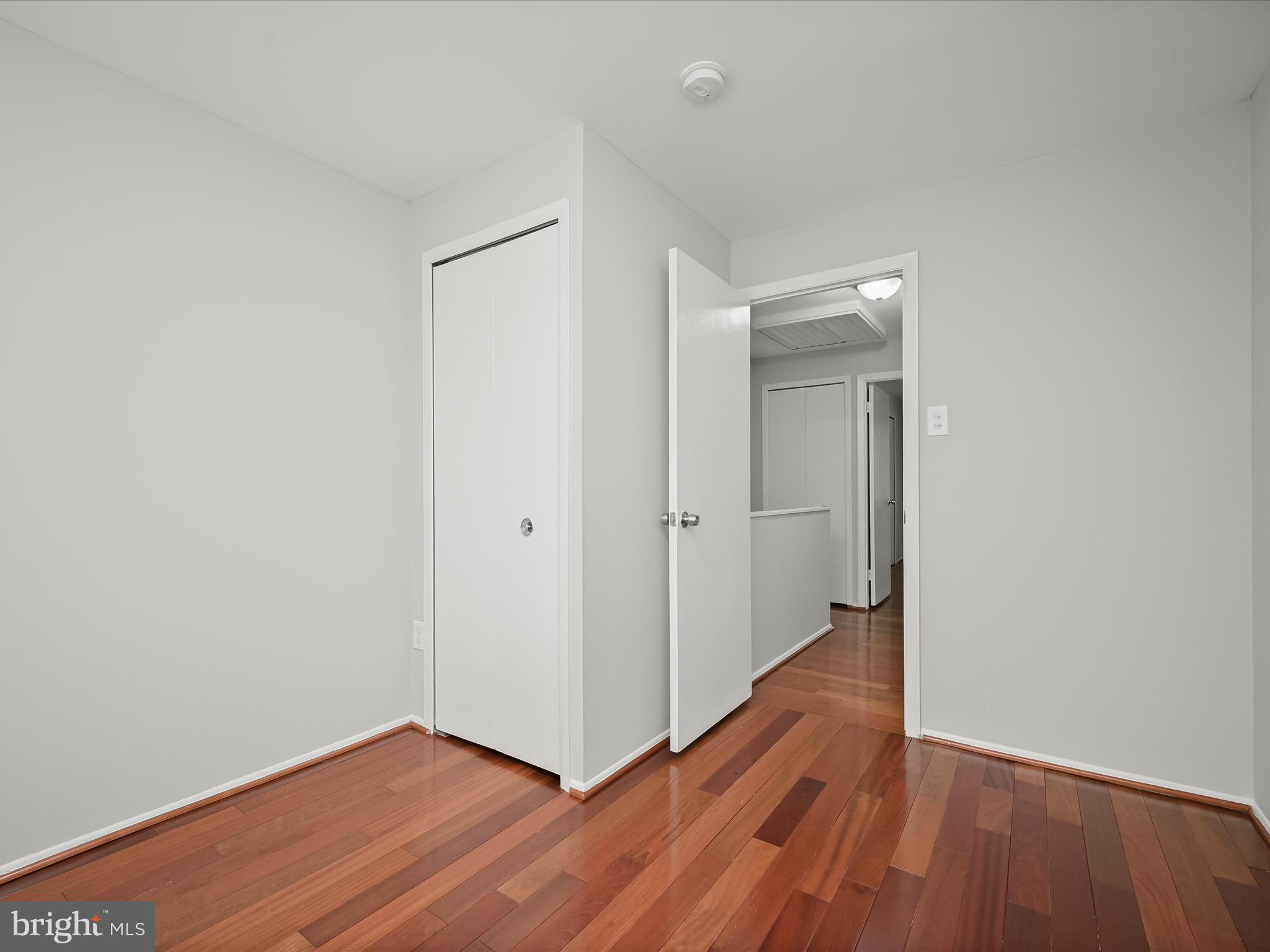 7106 Winter Rose Path Columbia, MD 21045 - Photo 23 of 50 a view of hallway with wooden floor