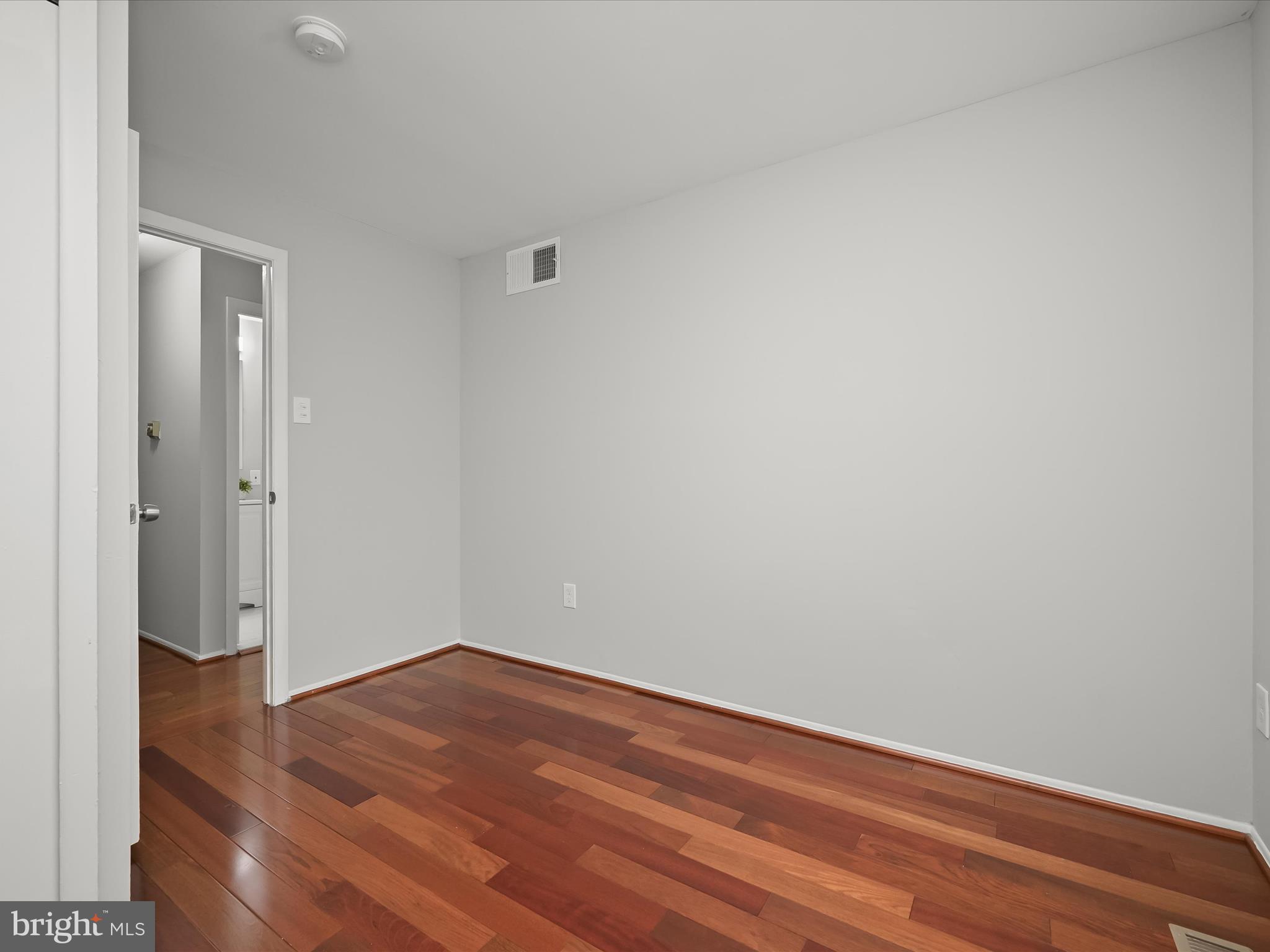 7106 Winter Rose Path Columbia, MD 21045 - Photo 24 of 50 a view of room with wooden floor