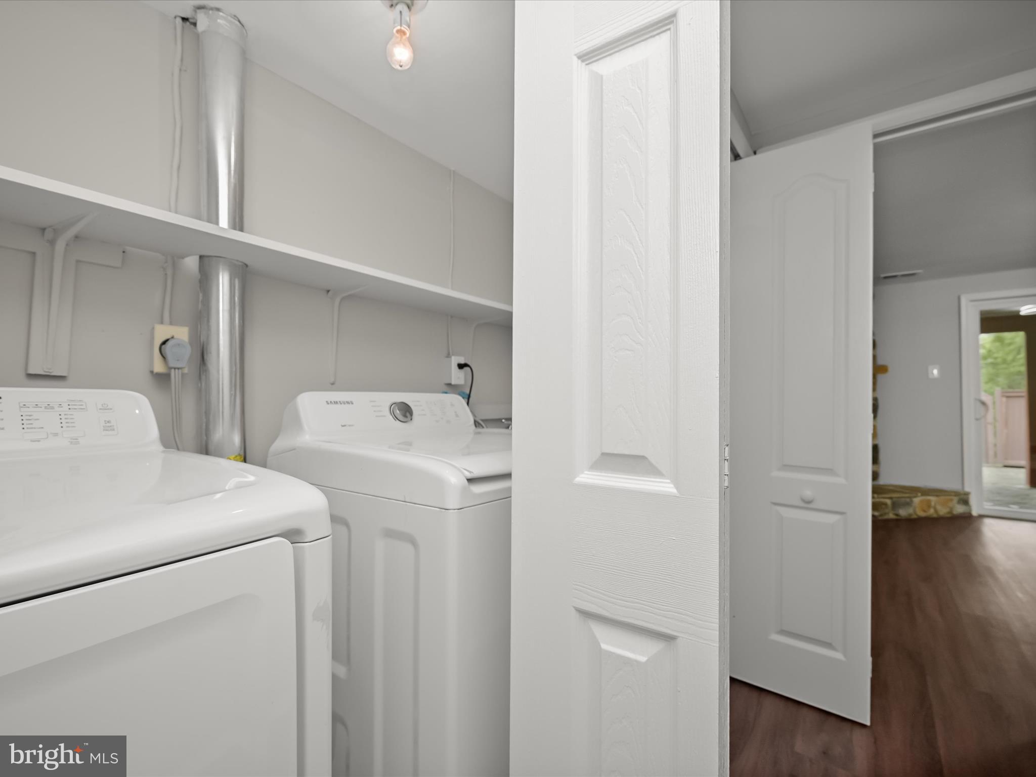 7106 Winter Rose Path Columbia, MD 21045 - Photo 36 of 50 a utility room with dryer and washer