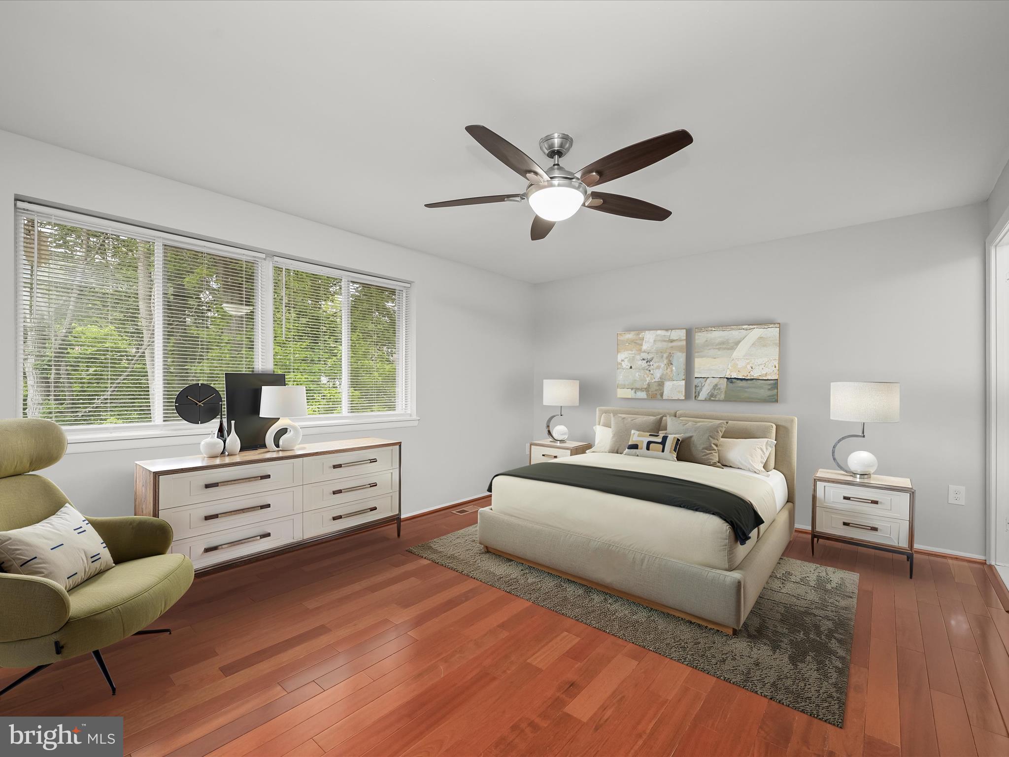 7106 Winter Rose Path Columbia, MD 21045 - Photo 5 of 50 a bedroom with a large bed and a large window