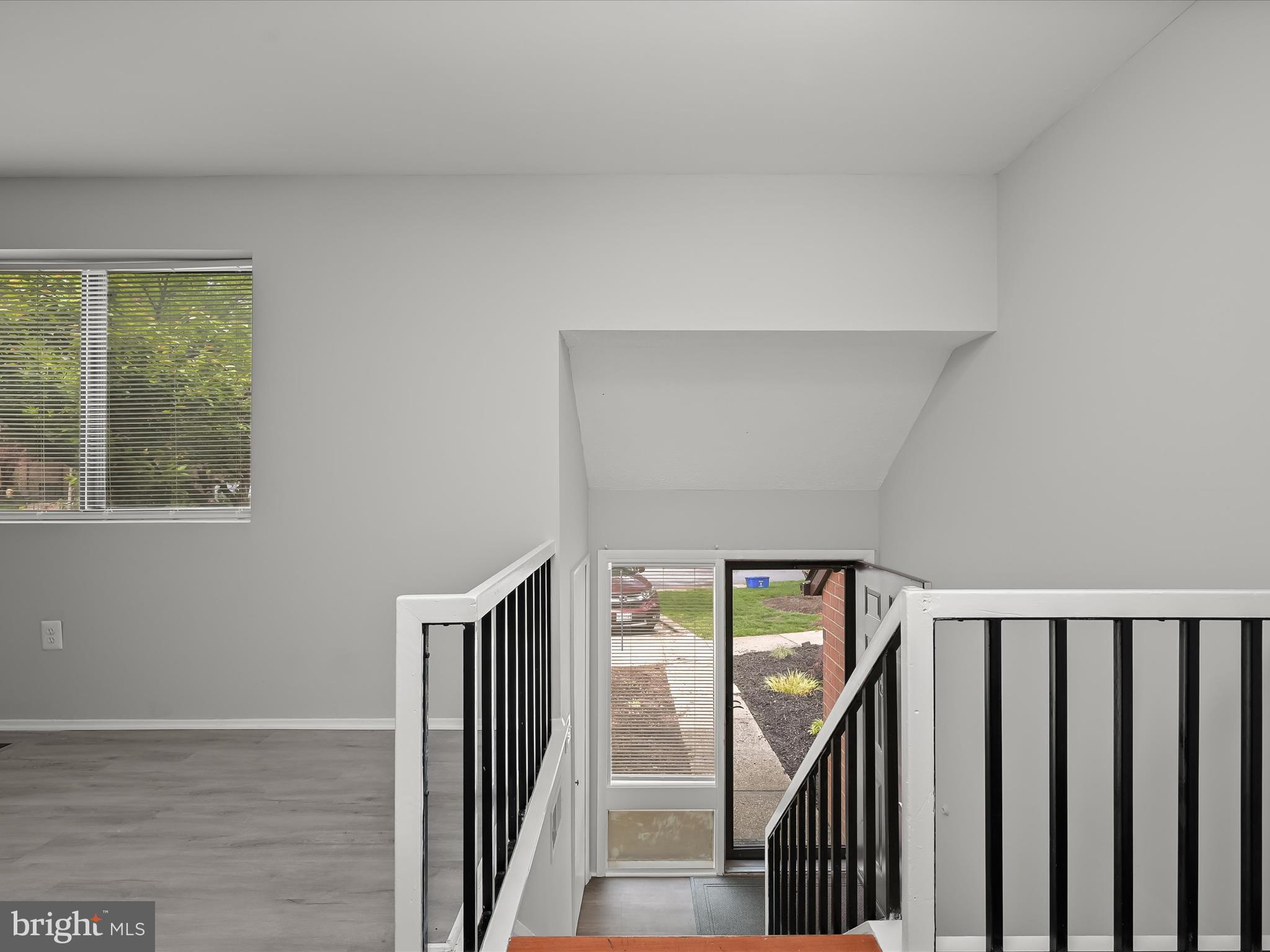 7106 Winter Rose Path Columbia, MD 21045 - Photo 6 of 50 a view of an entryway with wooden floor
