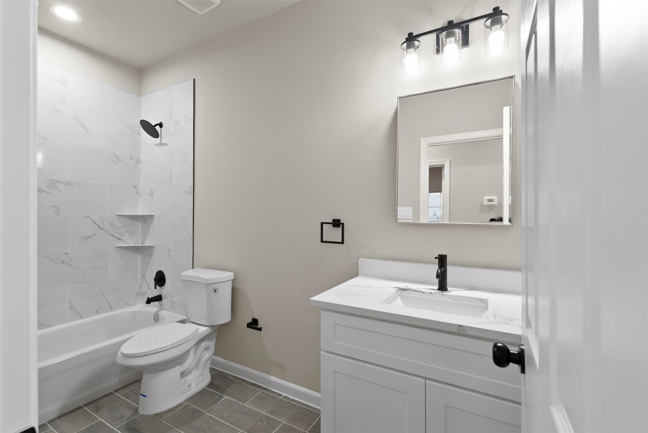 11763 White Cedar Street Willis, TX 77318 - Photo 11 of 22 2nd full bath with quartz