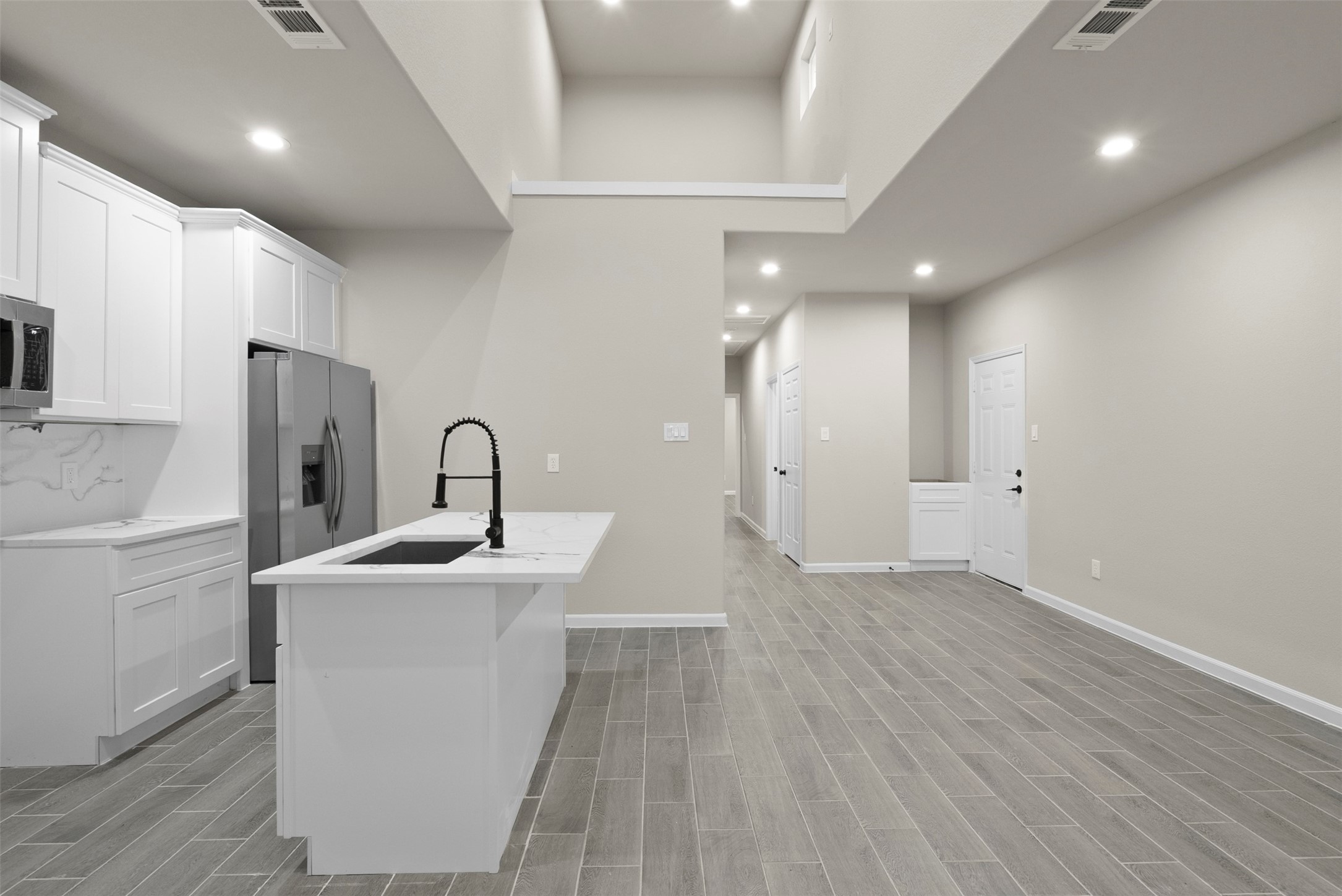 11763 White Cedar Street Willis, TX 77318 - Photo 3 of 22 Upstairs flex space - loft or study. Railing to be decided.