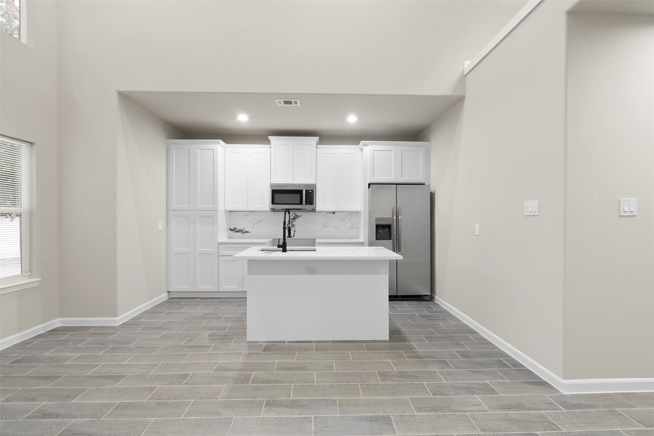 11763 White Cedar Street Willis, TX 77318 - Photo 7 of 22 Open kitchen/living