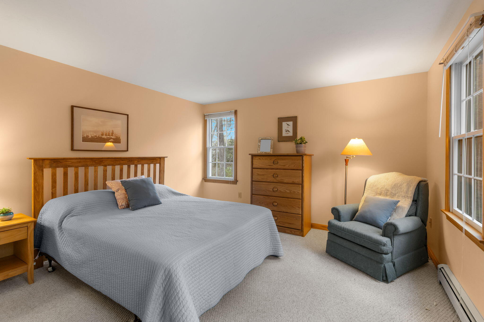 285 Blue Heron Road Wellfleet, MA 02667 - Photo 13 of 31 a bedroom with a bed and lamp