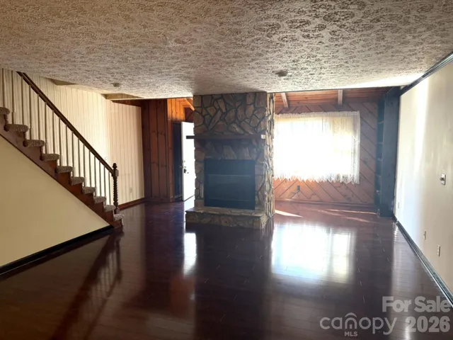 a view of gallery with wooden floor