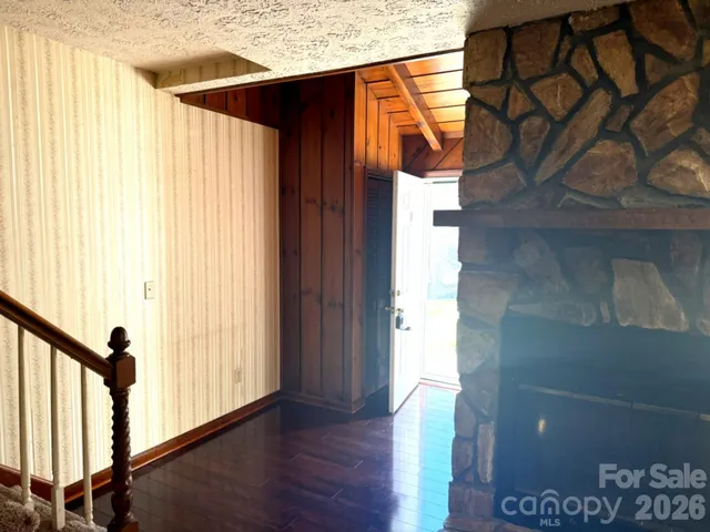 a view of entryway with wooden floor