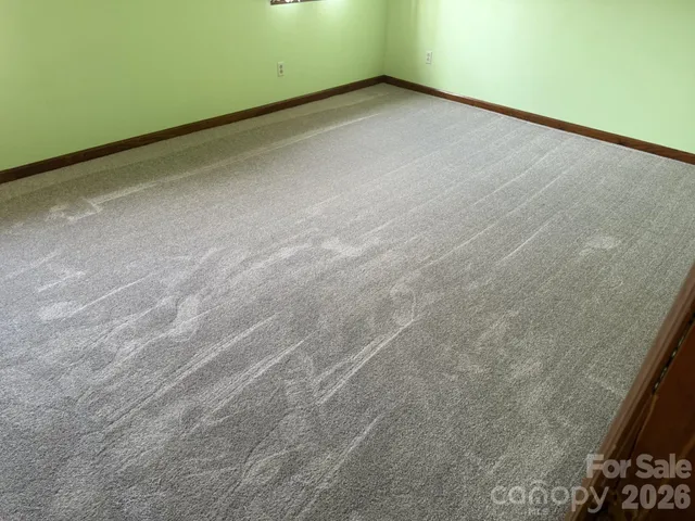 a view of a room with a window