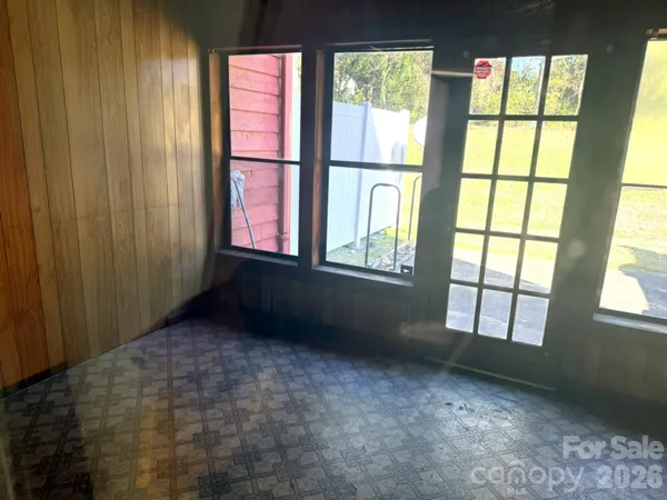 a view of an empty room and window