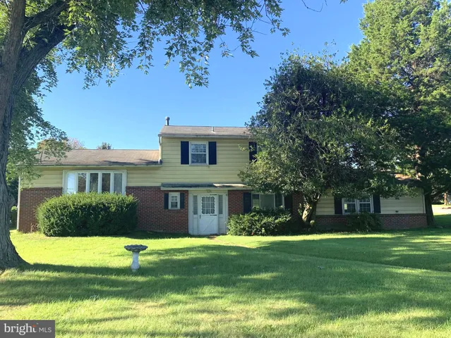 a view of a house with a swimming pool