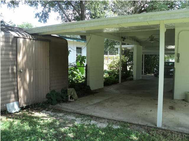 131 Vanderbilt Road Pensacola, FL 32506 - Photo 3 of 9 Wonderful double carport, covered access to laundry area