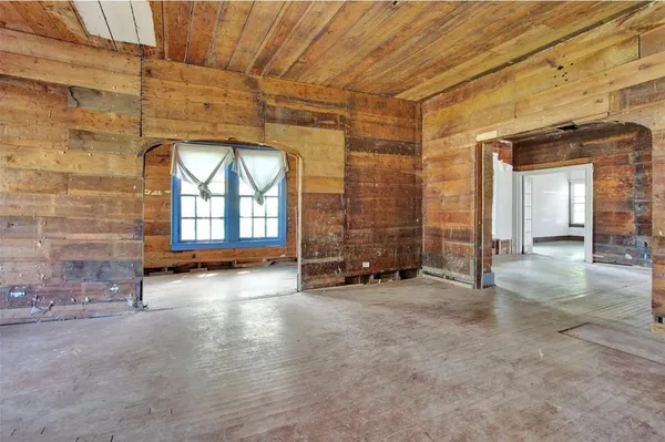 an empty room with windows