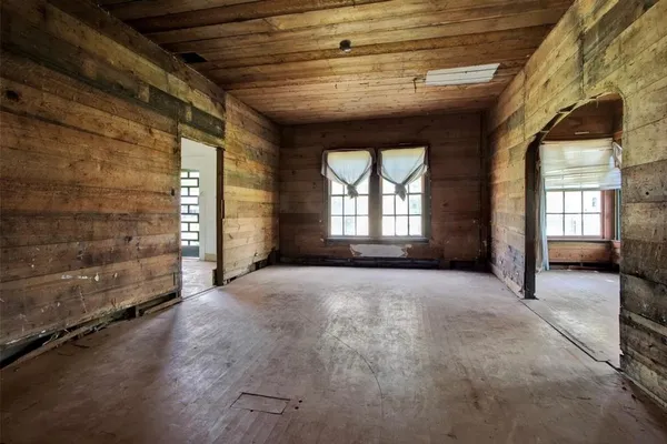 an empty room with windows