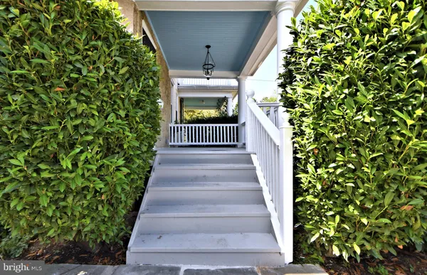 a view of a balcony with wooden floor