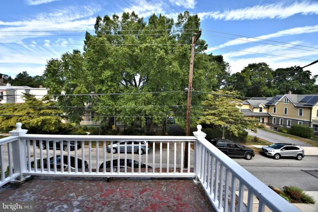 a view of a room with wooden walls