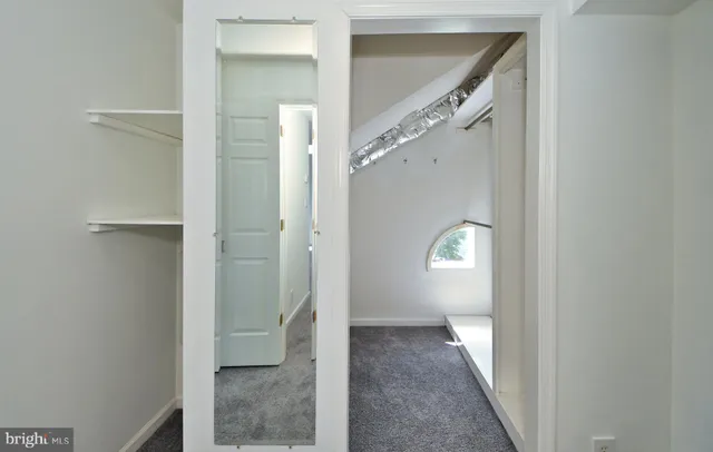 a backyard of a house with yard and outdoor seating