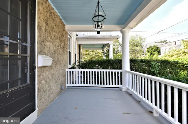a front view of a house with a shower
