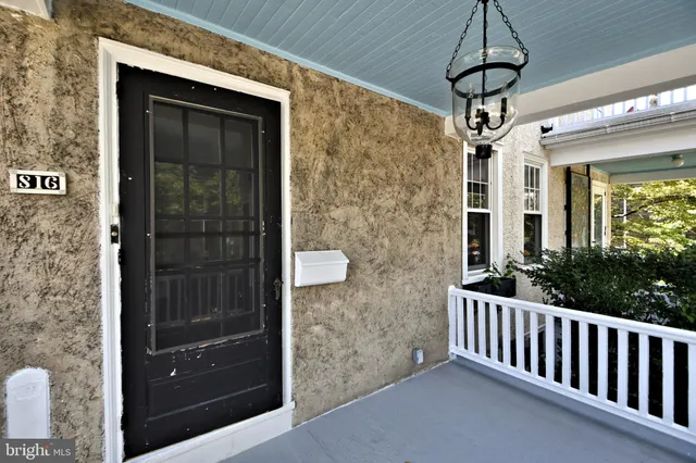 a metallic refrigerator freezer sitting in a kitchen