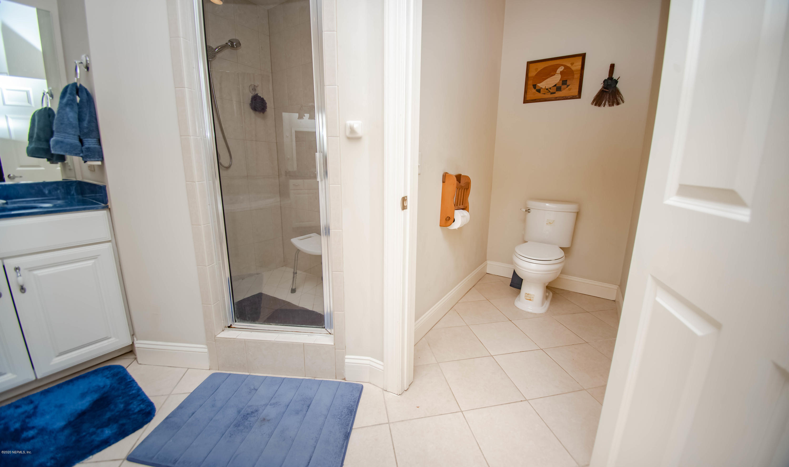 8219 Mud Lake Road Macclenny, FL 32063 - Photo 32 of 63 a bathroom with a sink and a toilet