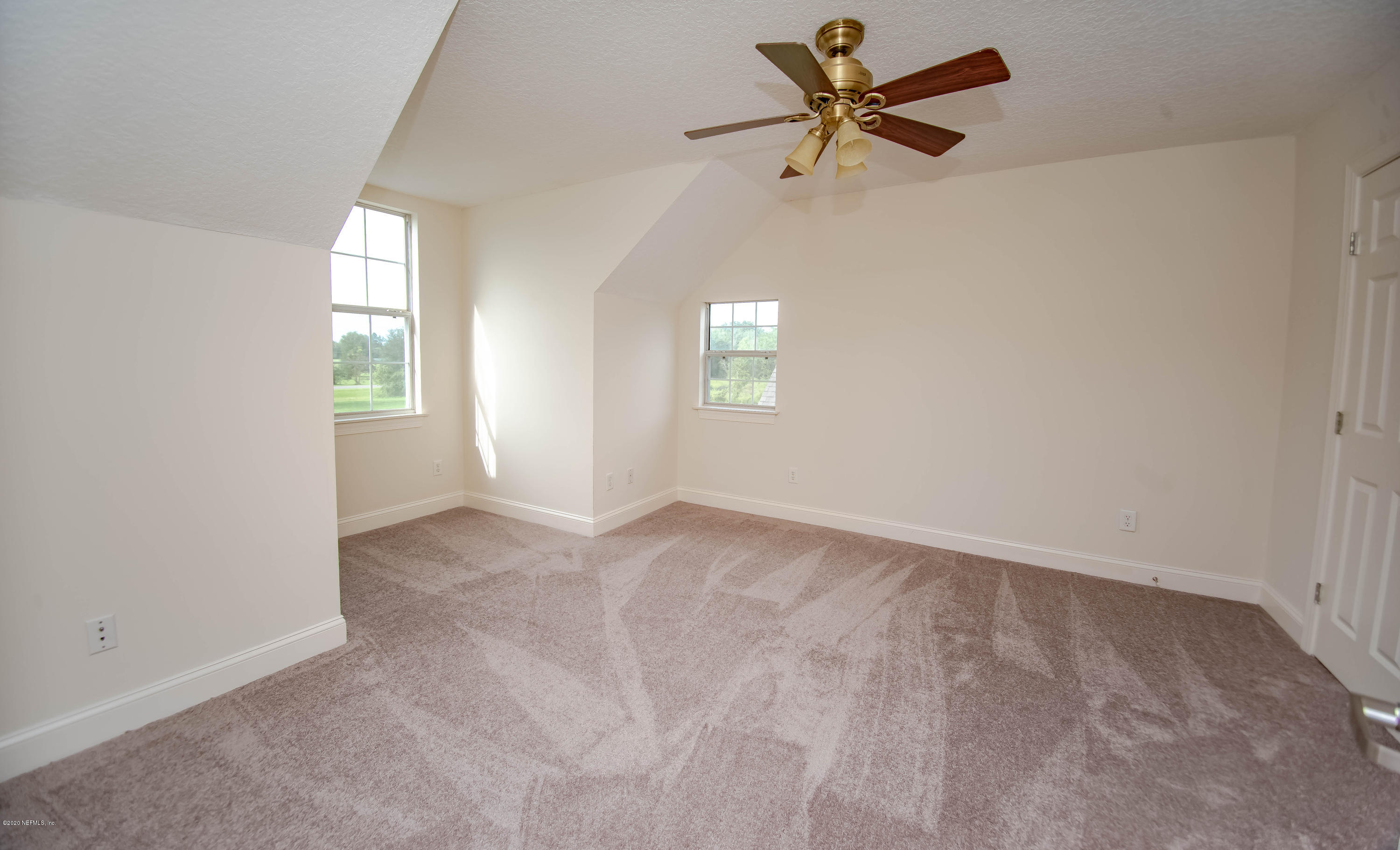 8219 Mud Lake Road Macclenny, FL 32063 - Photo 39 of 63 an empty room that has a window in it