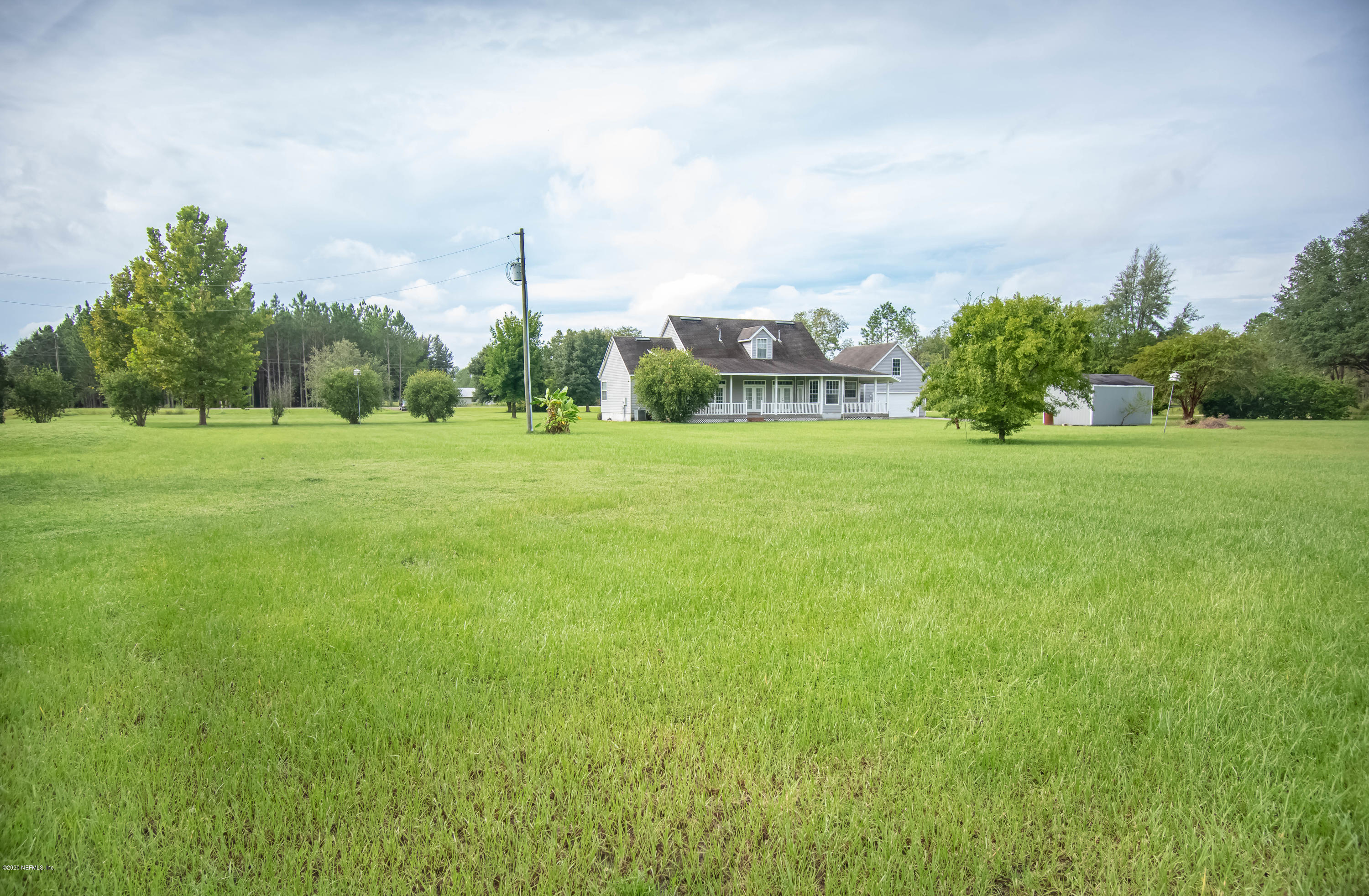 8219 Mud Lake Road Macclenny, FL 32063 - Photo 56 of 63 a big yard with lots of green space