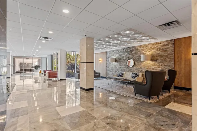 a view of a lobby with furniture