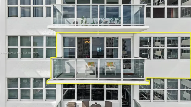 a view of swimming pool with seating space