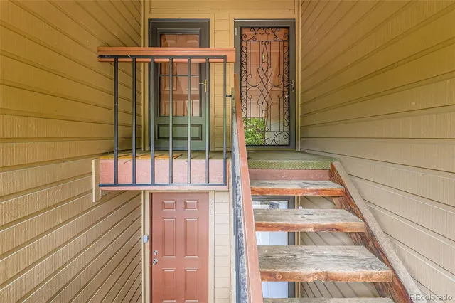 a view of balcony with floor to ceiling window