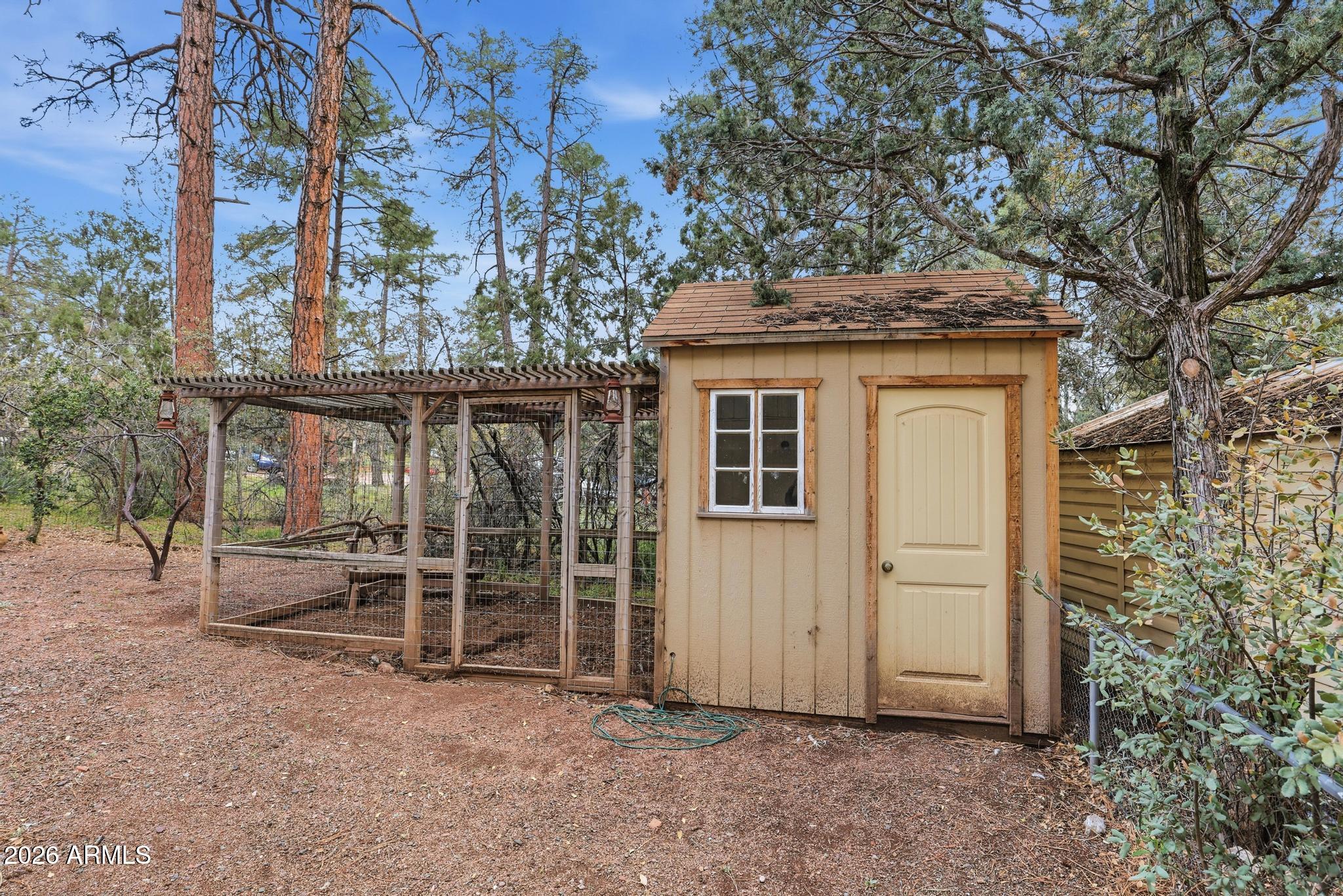 1103 South Pineview Circle Payson, AZ 85541 - Photo 35 of 42 an outdoor view of house with backyard