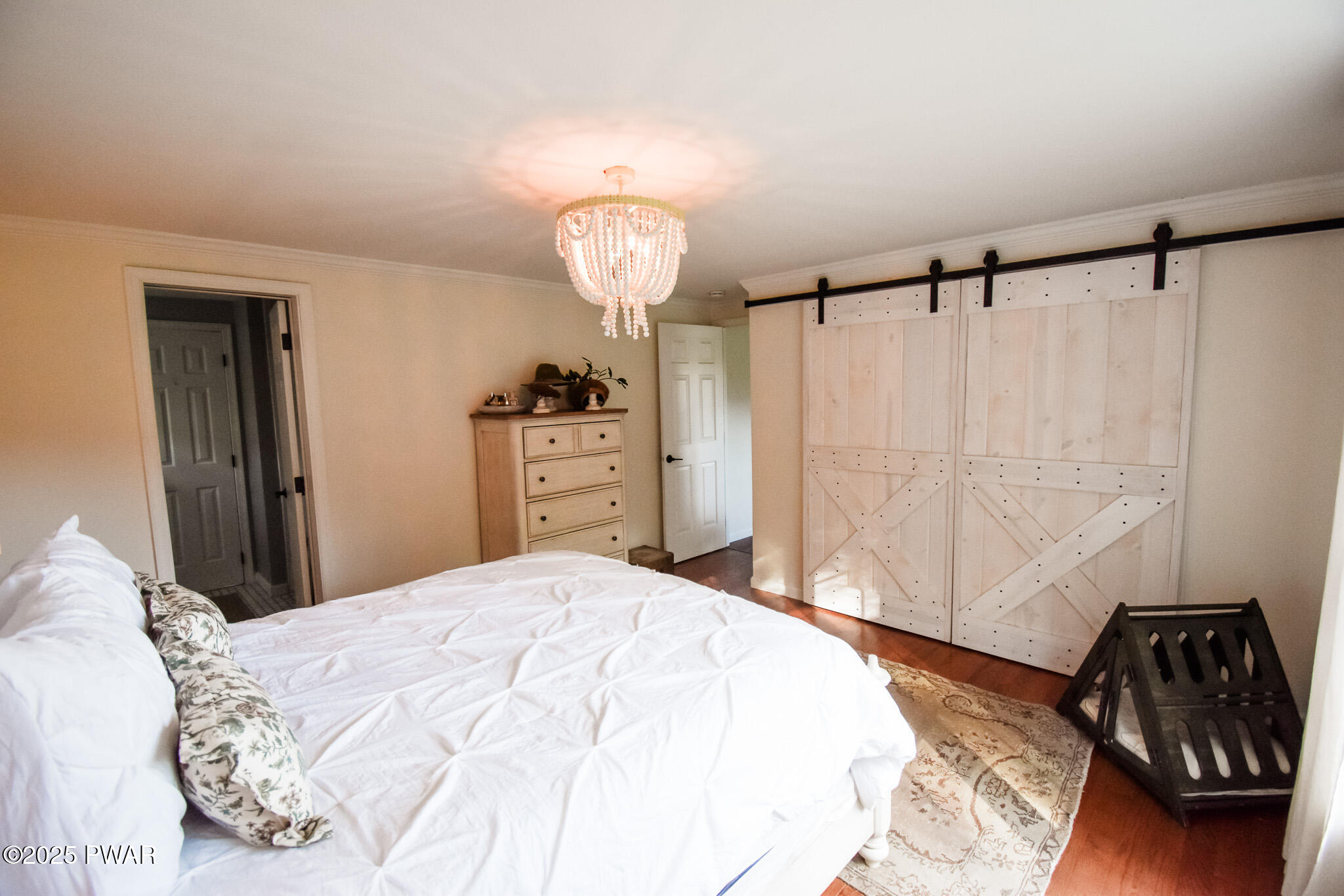 66 Wash Road Waymart, PA 18472 - Photo 20 of 41 a bedroom with a bed and a chair