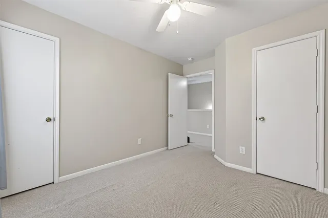 an empty room with a bathroom