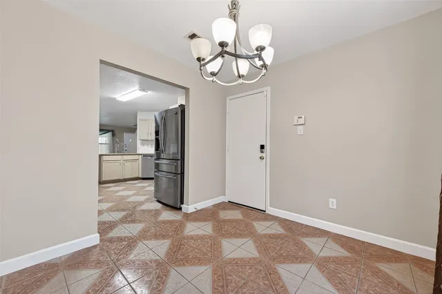 a view of a chandelier in a room