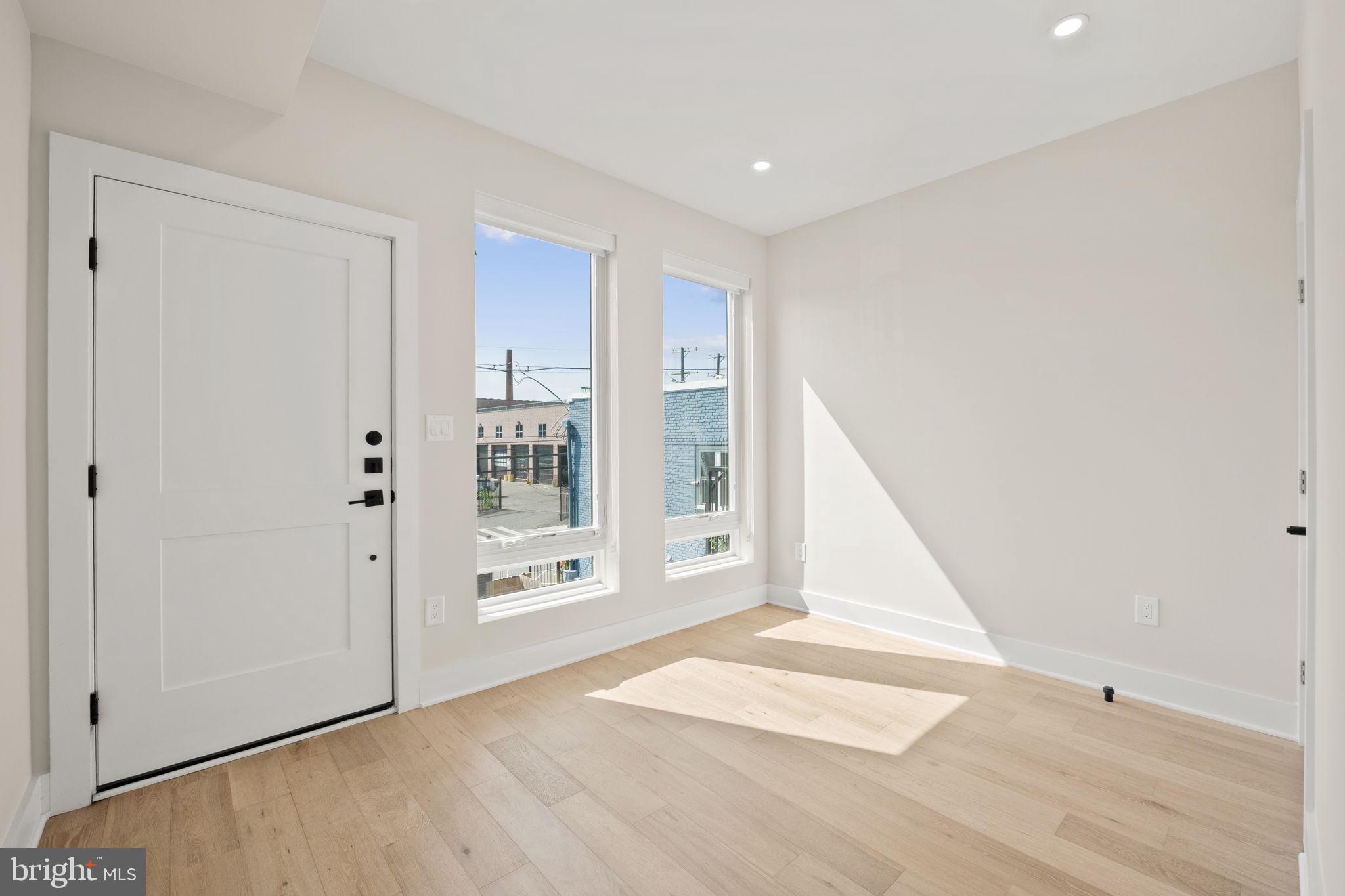 1923 Capitol Avenue Northeast, Unit 2 Washington, DC 20002 - Photo 14 of 32 a view of an entryway with wooden floor