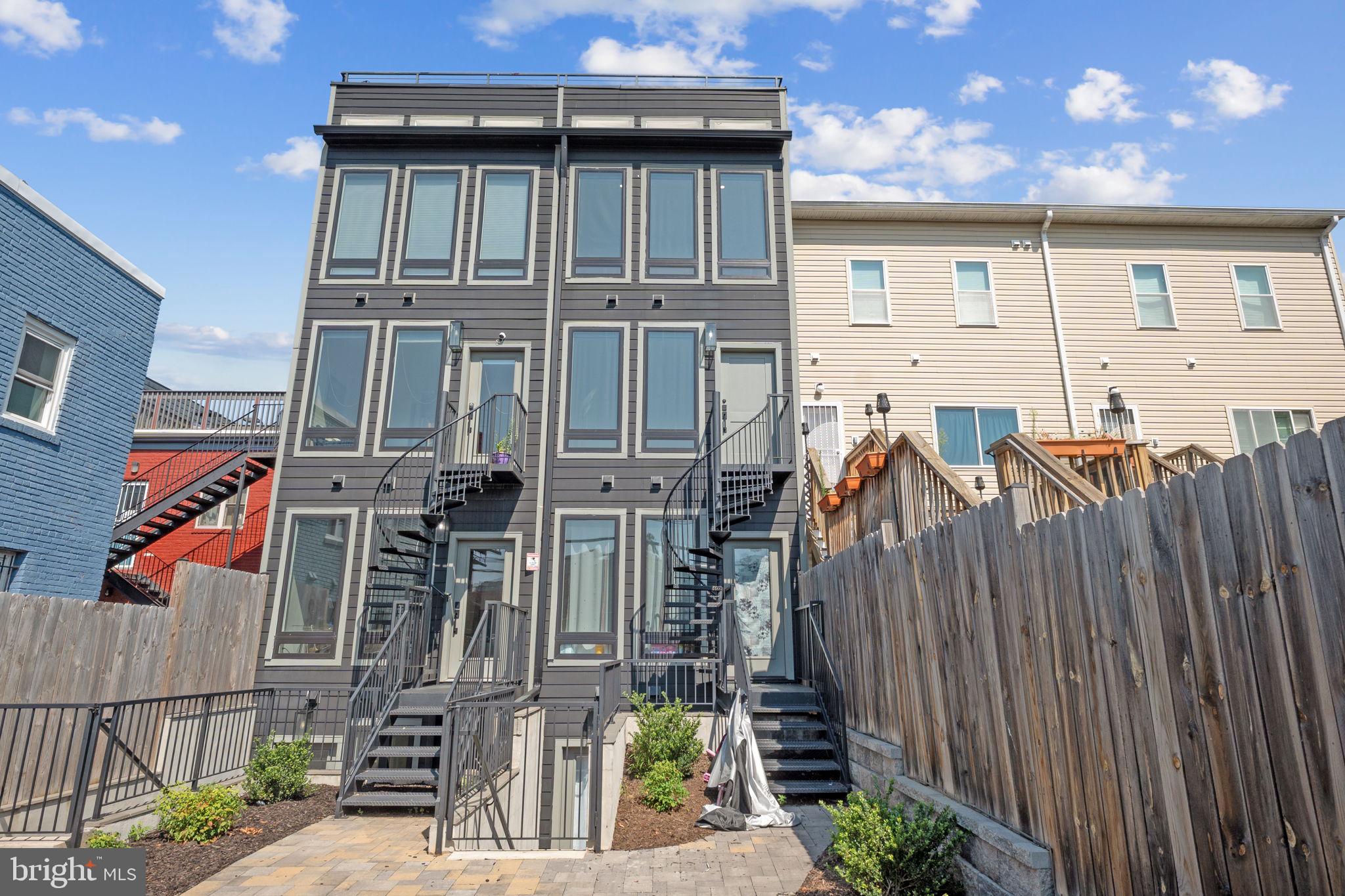 1923 Capitol Avenue Northeast, Unit 2 Washington, DC 20002 - Photo 32 of 32 a view of a house with wooden fence