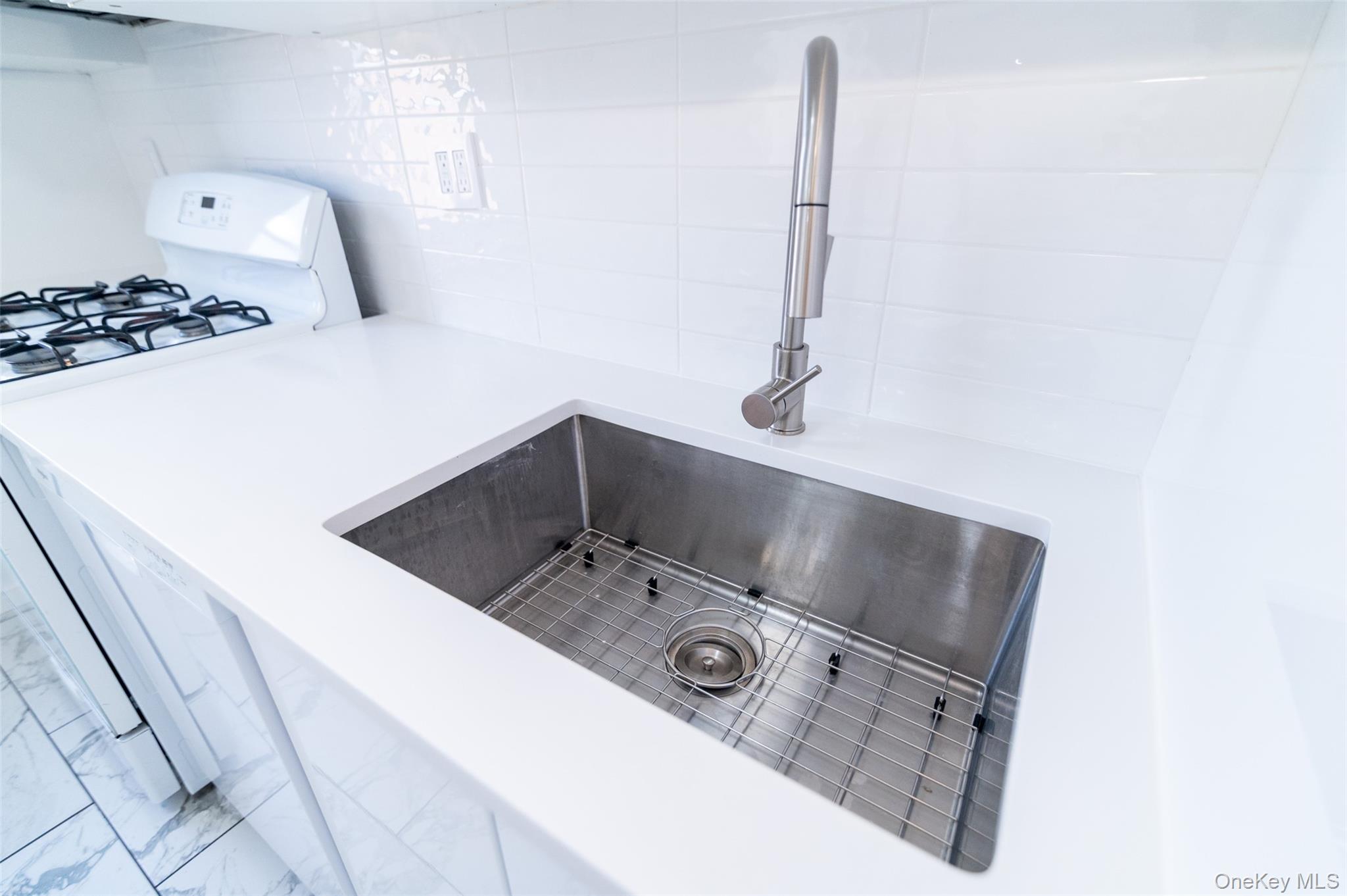 1 Sadore Lane, Unit 5A Yonkers, NY 10710 - Photo 11 of 23 a close view of sink and tap