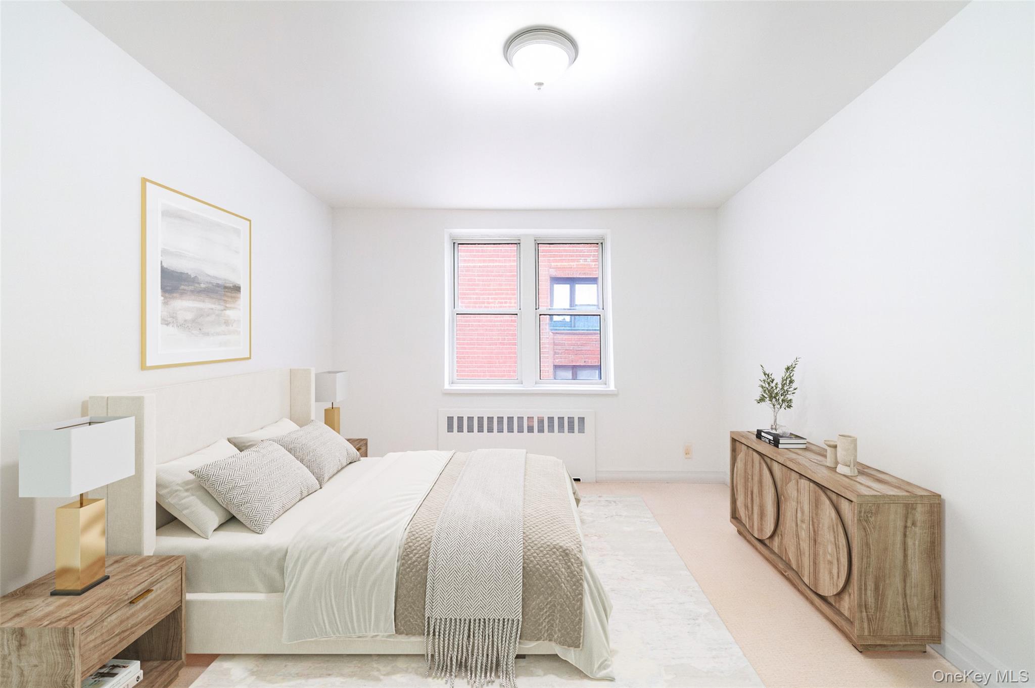 1 Sadore Lane, Unit 5A Yonkers, NY 10710 - Photo 14 of 23 a bedroom with a bed and a window