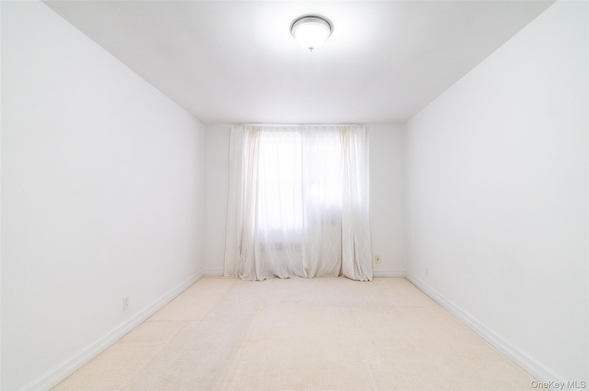 1 Sadore Lane, Unit 5A Yonkers, NY 10710 - Photo 15 of 23 a view of room with window