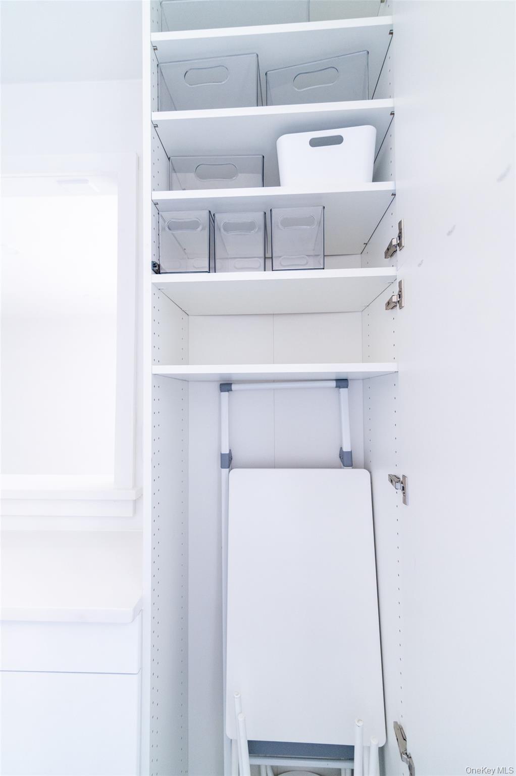 1 Sadore Lane, Unit 5A Yonkers, NY 10710 - Photo 21 of 23 a view of storage and utility room with racks on the wall