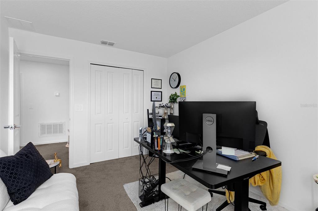 34535 Shellback Street Leesburg, FL 34788 - Photo 34 of 36 a view of a workspace with furniture