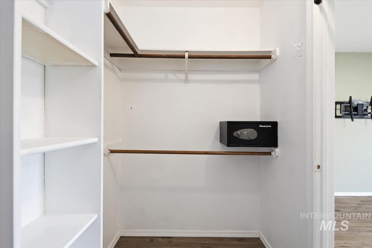 7091 West Limelight Street Boise, ID 83714 - Photo 23 of 34 Walk in closet featuring dark wood-style flooring
