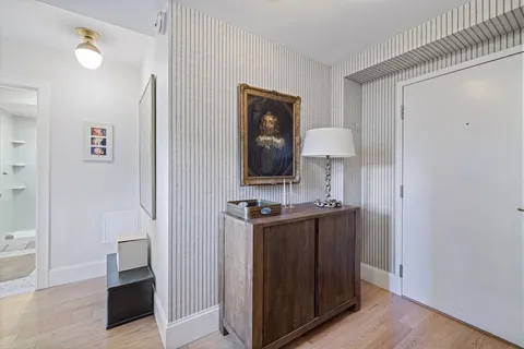 a view of a kitchen from the hallway