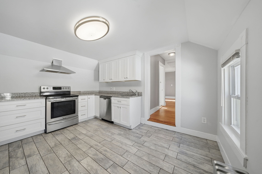 20 Wilson Street, Unit 2 Natick, MA 01760 - Photo 2 of 11 a kitchen with a stove oven and sink