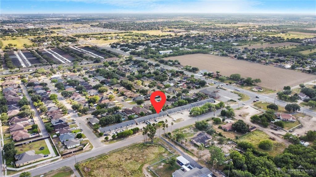 2714 West Mile 17 1/2 Road, Unit 23 Edinburg, TX 78541 - Photo 11 of 14 an aerial view of residential houses with outdoor space