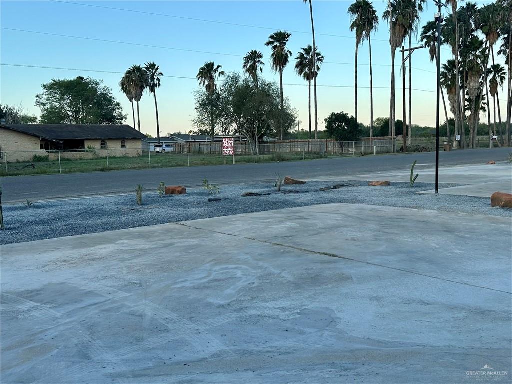 2714 West Mile 17 1/2 Road, Unit 23 Edinburg, TX 78541 - Photo 12 of 14 front view of a house with a yard