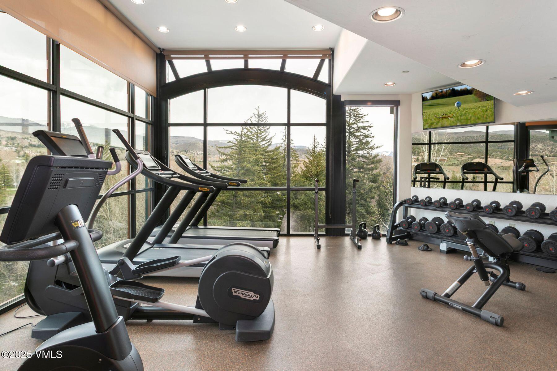 97 Main Street, Unit 304 Edwards, CO 81632 - Photo 23 of 31 a view of a room with gym equipment