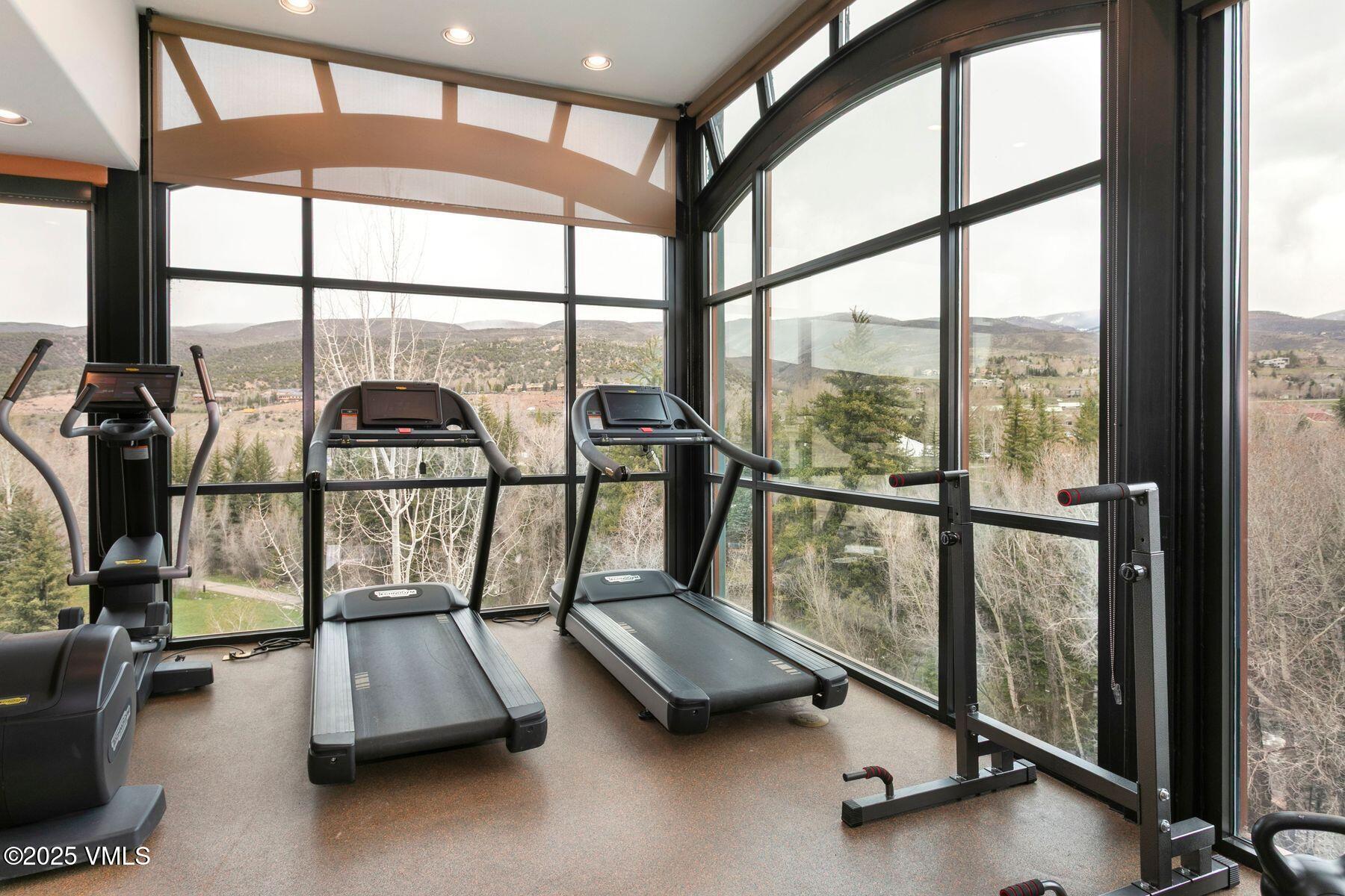 97 Main Street, Unit 304 Edwards, CO 81632 - Photo 24 of 31 a view of a room with gym equipment