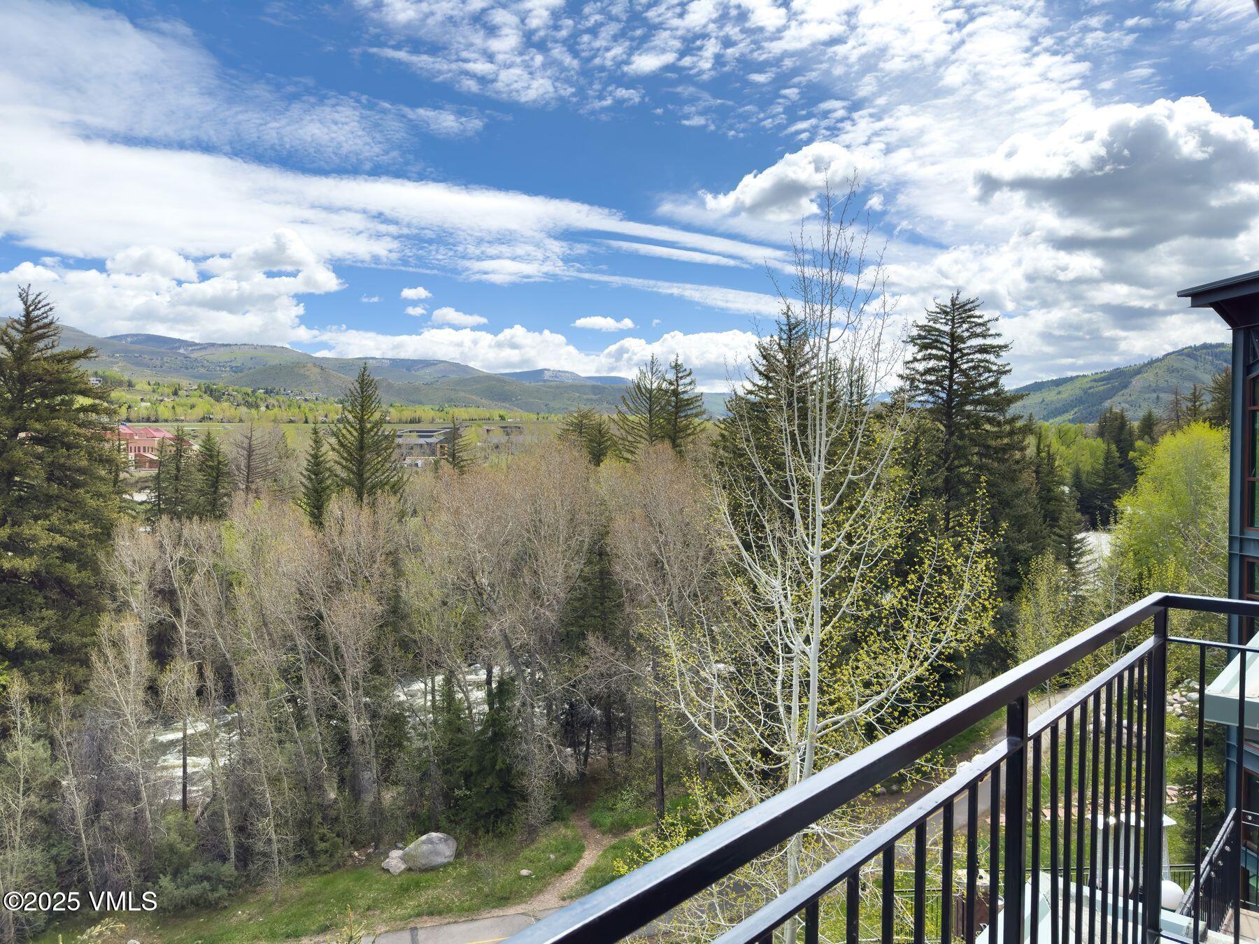 97 Main Street, Unit 304 Edwards, CO 81632 - Photo 6 of 31 a view of a yard from a balcony