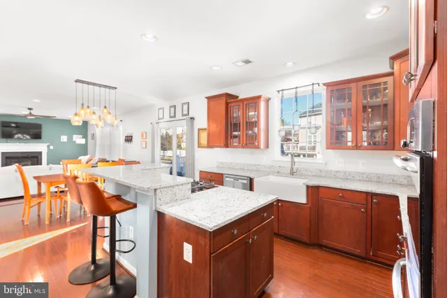 a large kitchen with a table and chairs in it