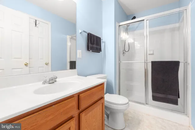 a view of roof deck with couches