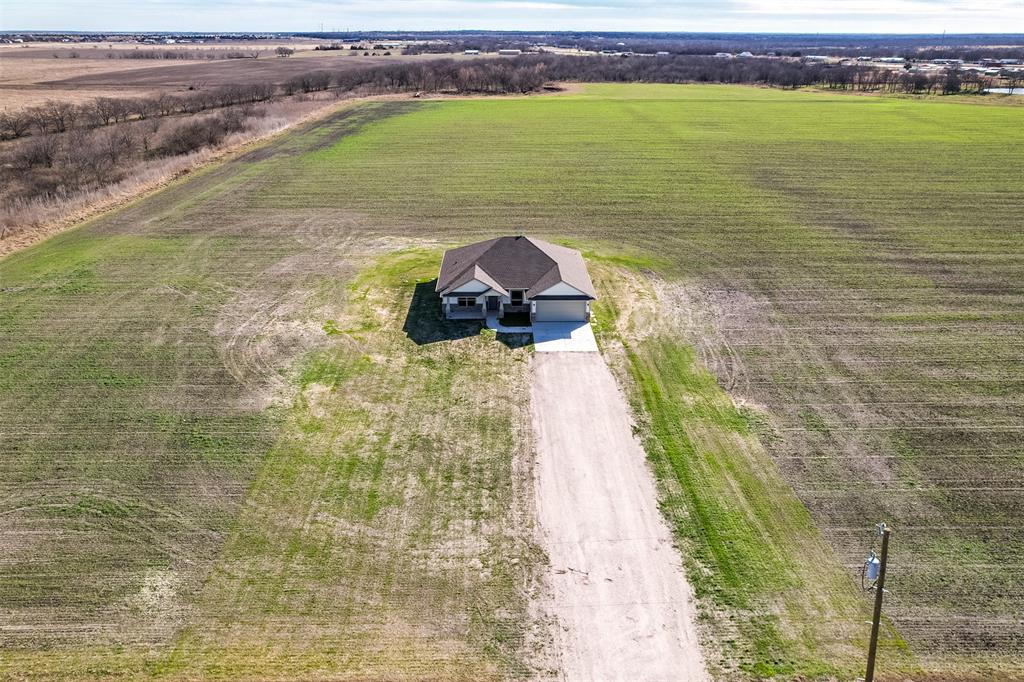 138 Zmolek Road Alma, TX 75119 - Photo 26 of 29 a view of a lake from a balcony